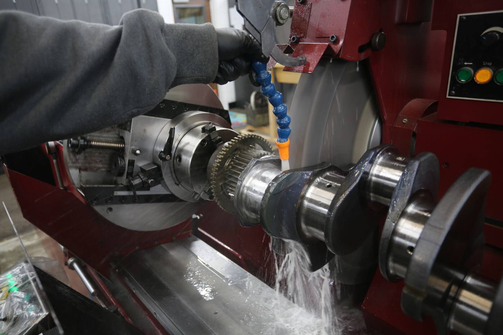 Careers page banner of an employee working on an engine